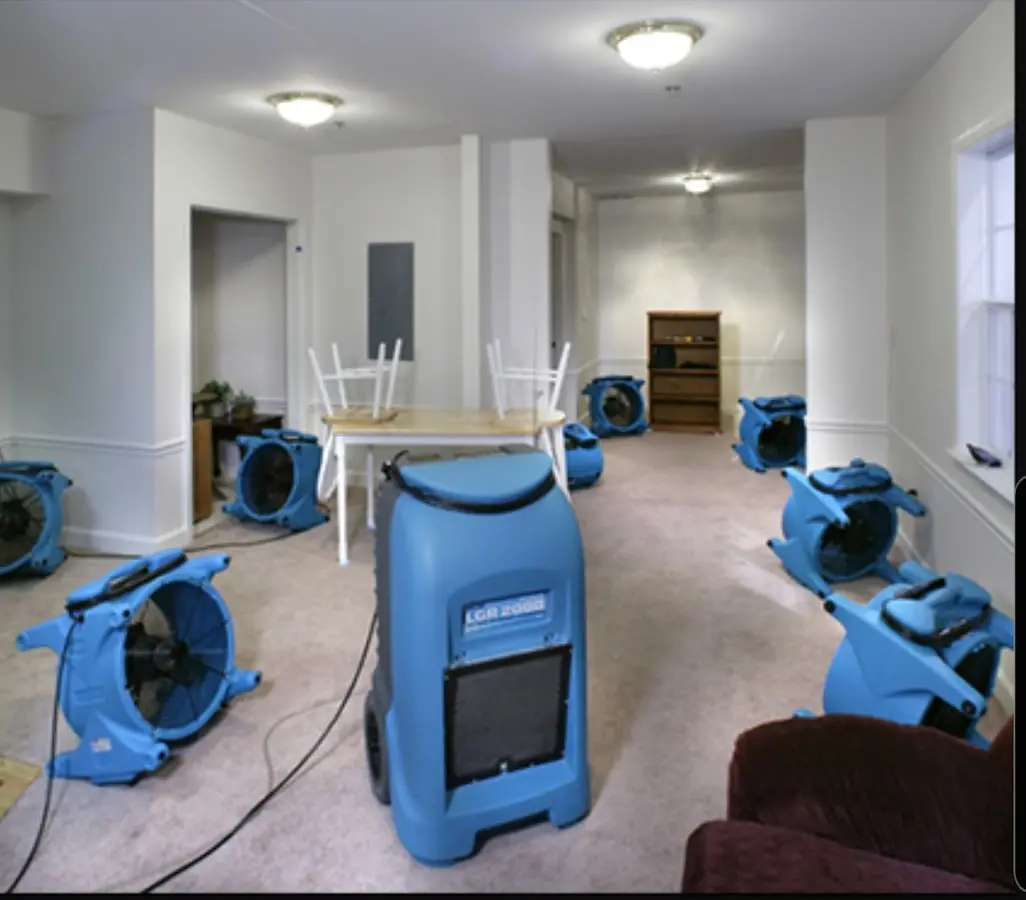 Air movers and dehumidifier setup for Water Extraction & Removal in Celina